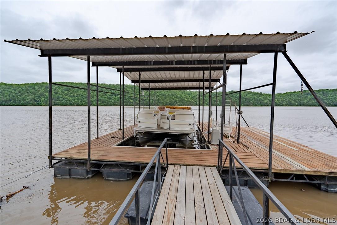 Image 3: 12x30' dock slip (2008 22' pontoon sweetens the de