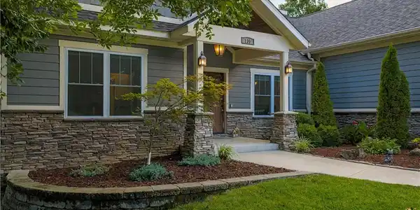 Image 4: This home has style and charm from landscaping to