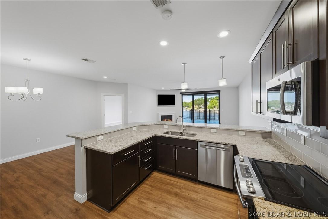 Image 4: Wonderful kitchen that is open to the living and d