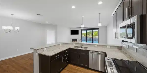 Image 4: Wonderful kitchen that is open to the living and d