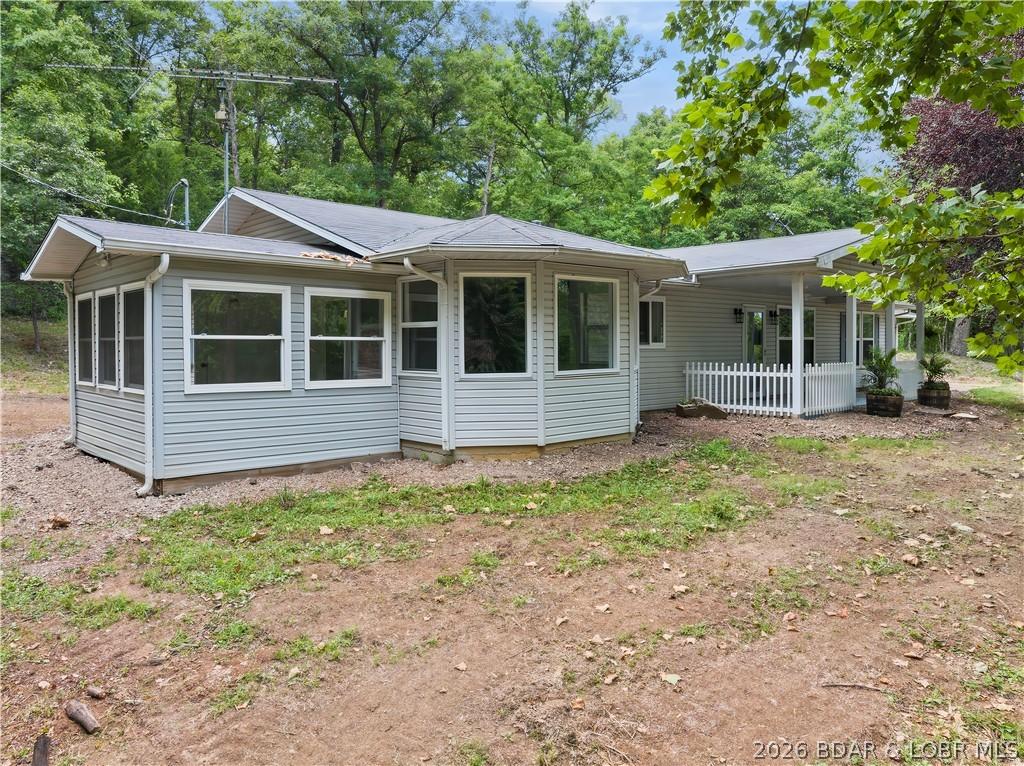 Image 3: Covered Porch & Bay Window