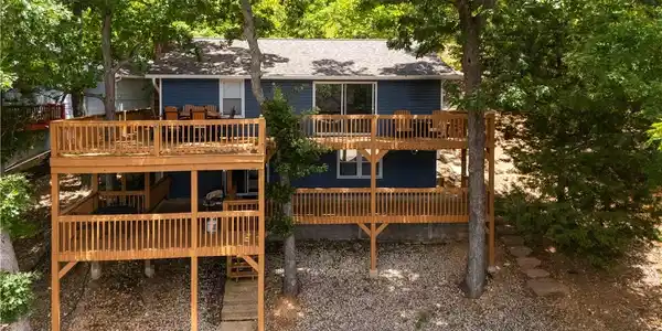 Image 3: Lakefront Home Exterior from the Water