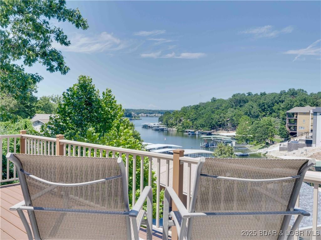 Image 2: Main level brand new deck with incredible lake vie