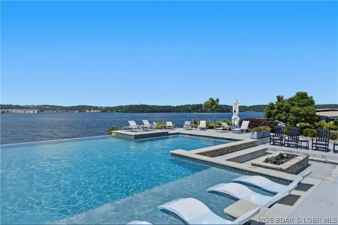 Image 1: Panoramic Lake Views from the Balcony