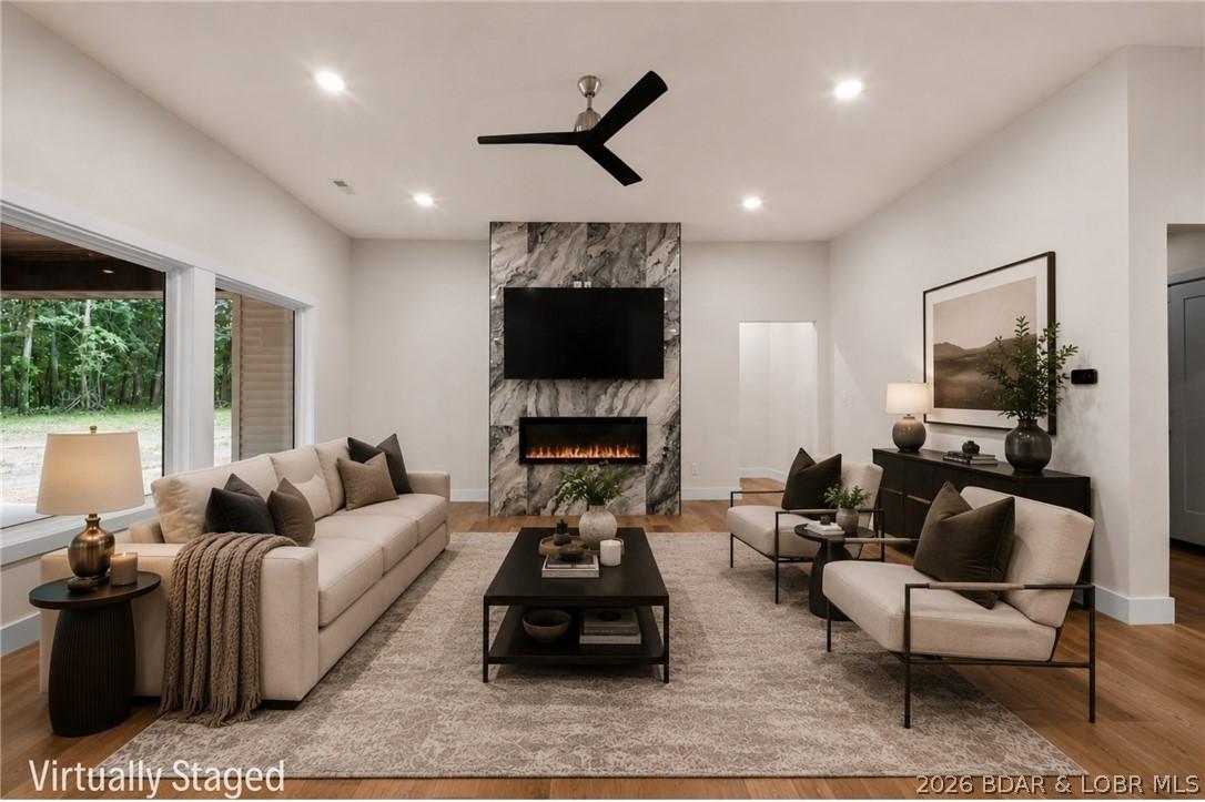 Image 3: Spacious Living Room w/ Gorgeous Marble Fireplace