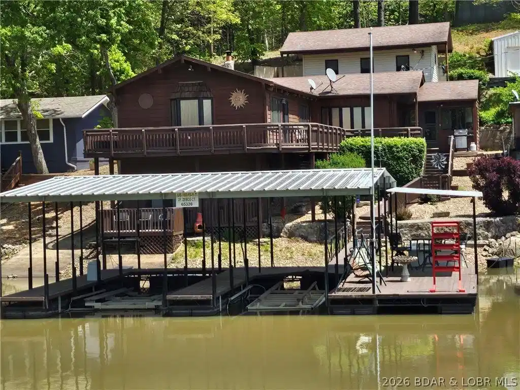 Image 1: Lakeside View of house & dock from