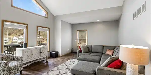 Image 3: Main level living room & nice lakeview.