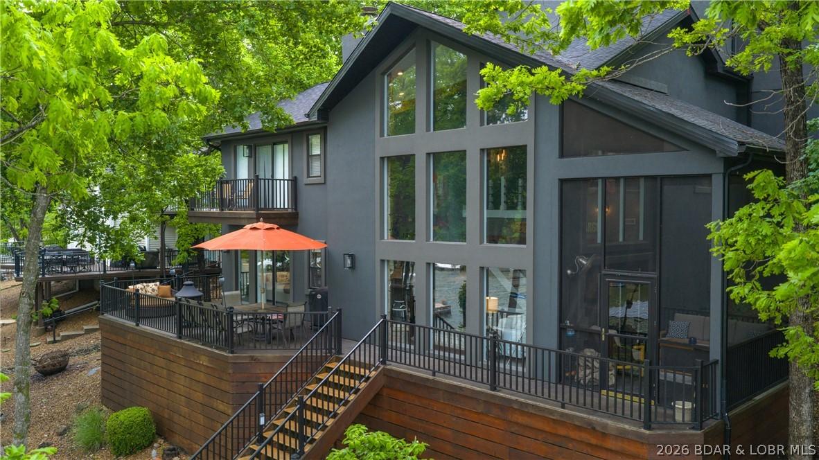 Image 1: This modern rustic feel brings the outdoors in!
