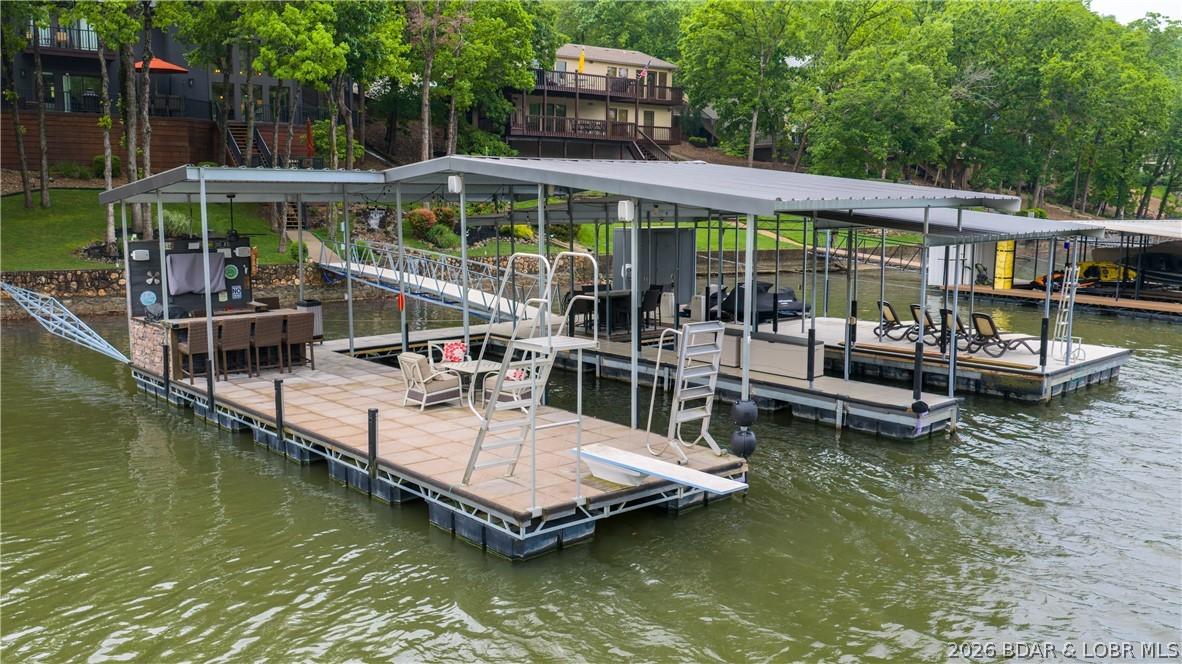 Image 4: The perfect entertaining dock in no wake cove--lar