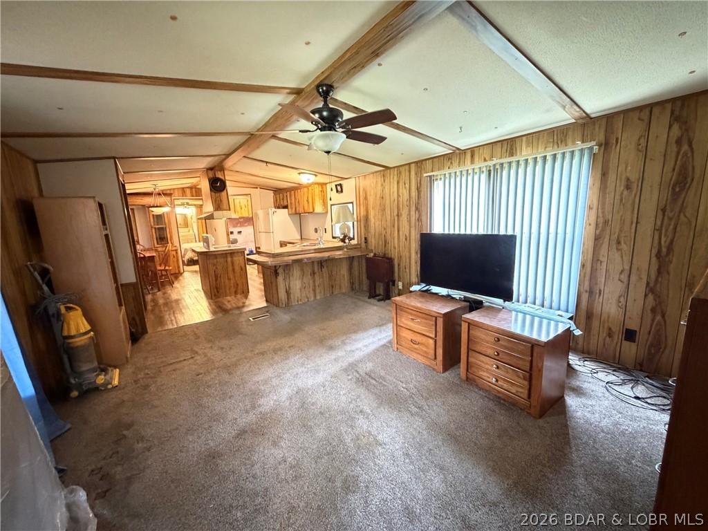 Image 3: living room is open to kitchen