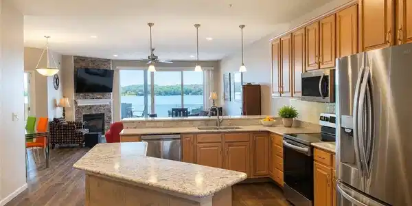 Image 3: 3. Kitchen/Living room with lake view