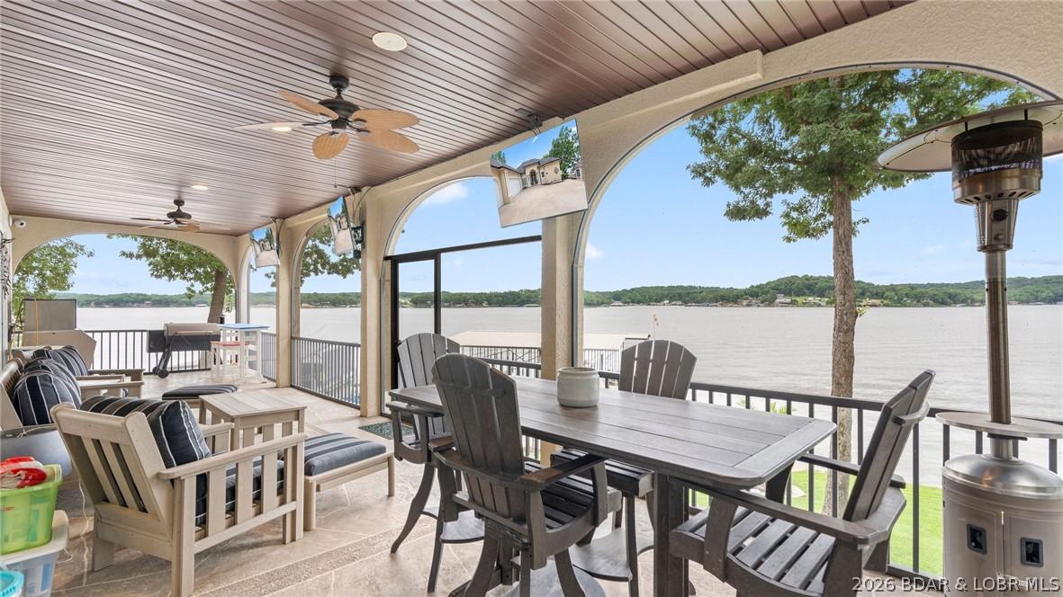 Image 3: Covered Deck Overlooking the lake