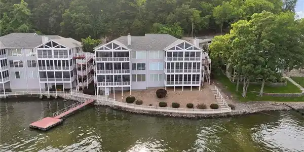 Image 2: View from lake. Top floor, left of building