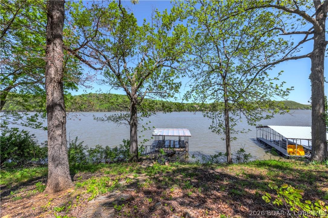 Image 3: 75ft of lakefront lot