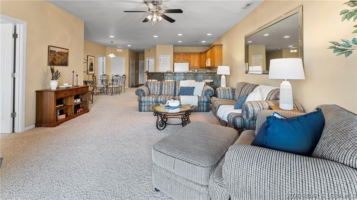 Image 3: An open floor plan with plenty of entertainment sp