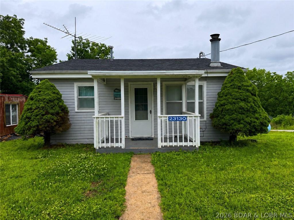 Image 3: Inviting Covered Porch