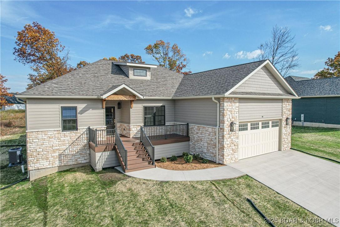 Image 1: This new construction has great curb appeal and is