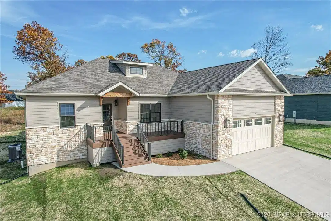 Image 1: This new construction has great curb appeal and is