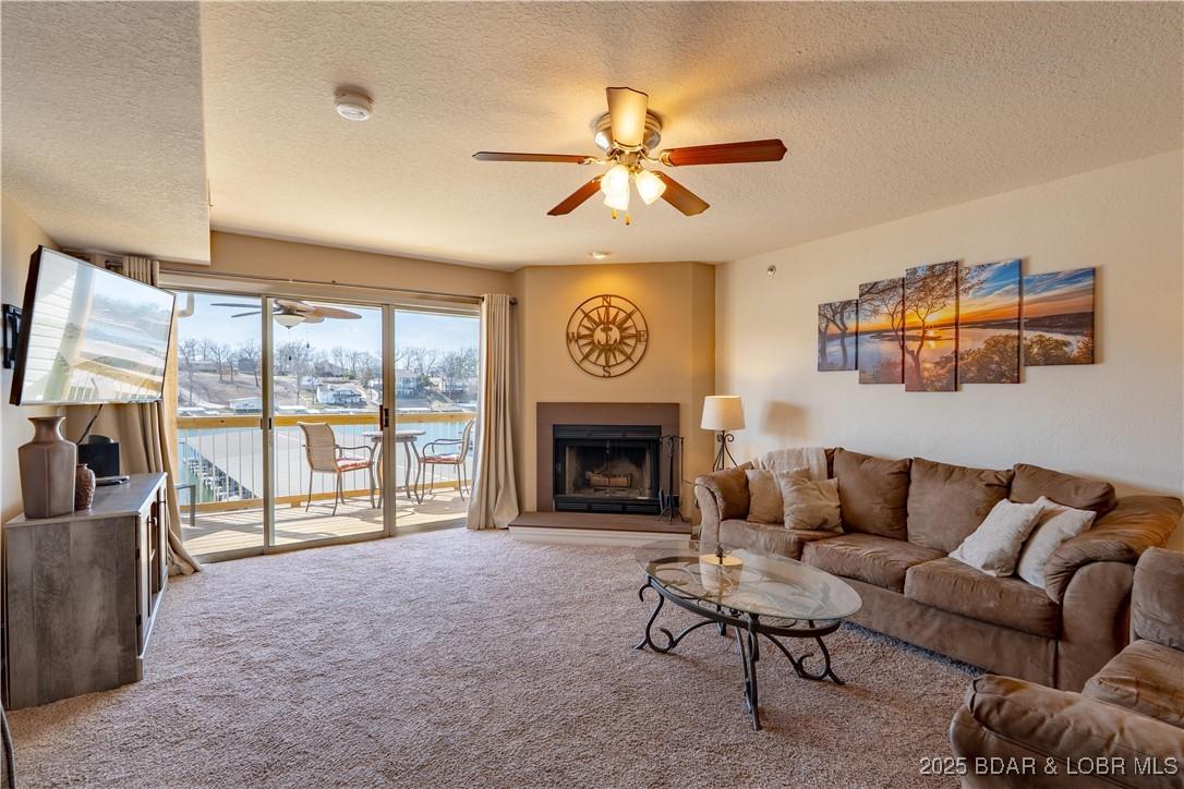 Image 3: Living room w/cozy fireplace