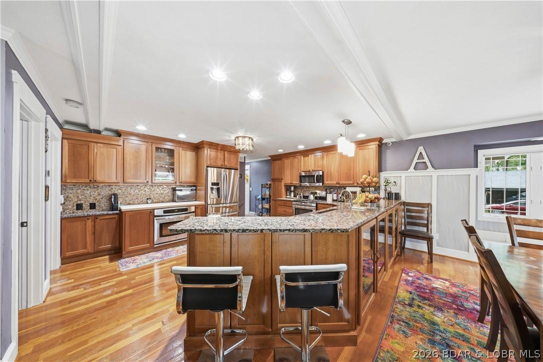Image 4: Harwood floors on the main level