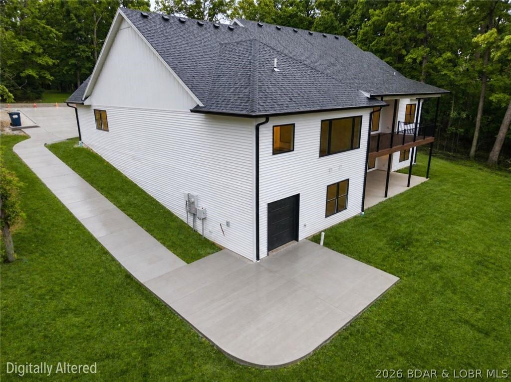 Image 2: Lower Garage with cart path for golf cart or extra