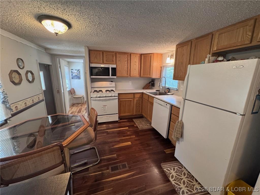 Image 4: Kitchen and Dining Area