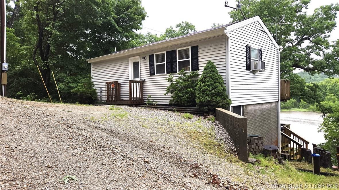Image 1: Side of home