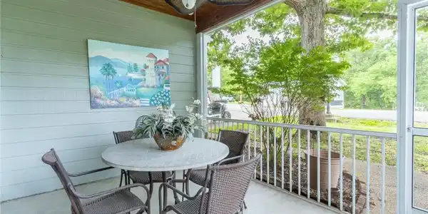 Image 4: 1 of 2 screened in patios