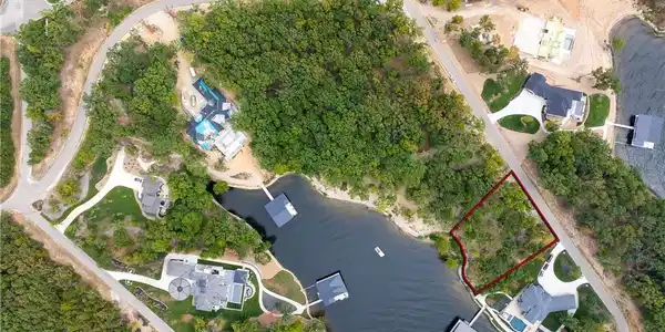 Image 4: Large estate lot with deep water