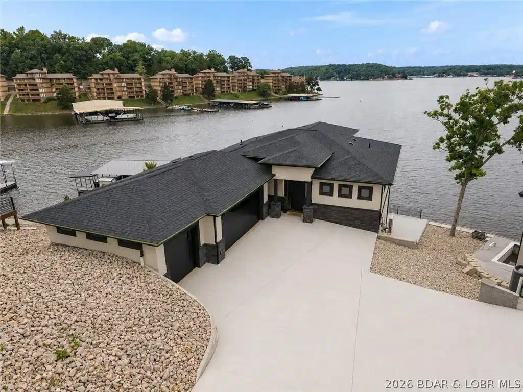 Image 1: Stunning aerial view showcasing this exceptional l