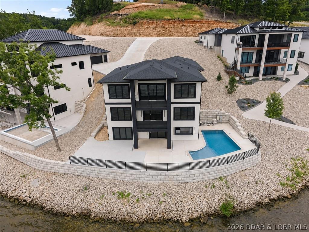 Image 3: Elevated aerial perspective highlighting the home'