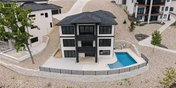 Image 3: Elevated aerial perspective highlighting the home'