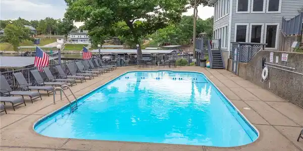 Image 2: Pool is right next to the unit.
