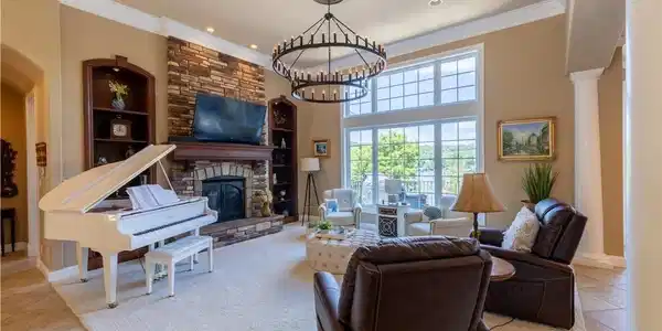 Image 3: Stone fireplace with custom mantle and built in ac
