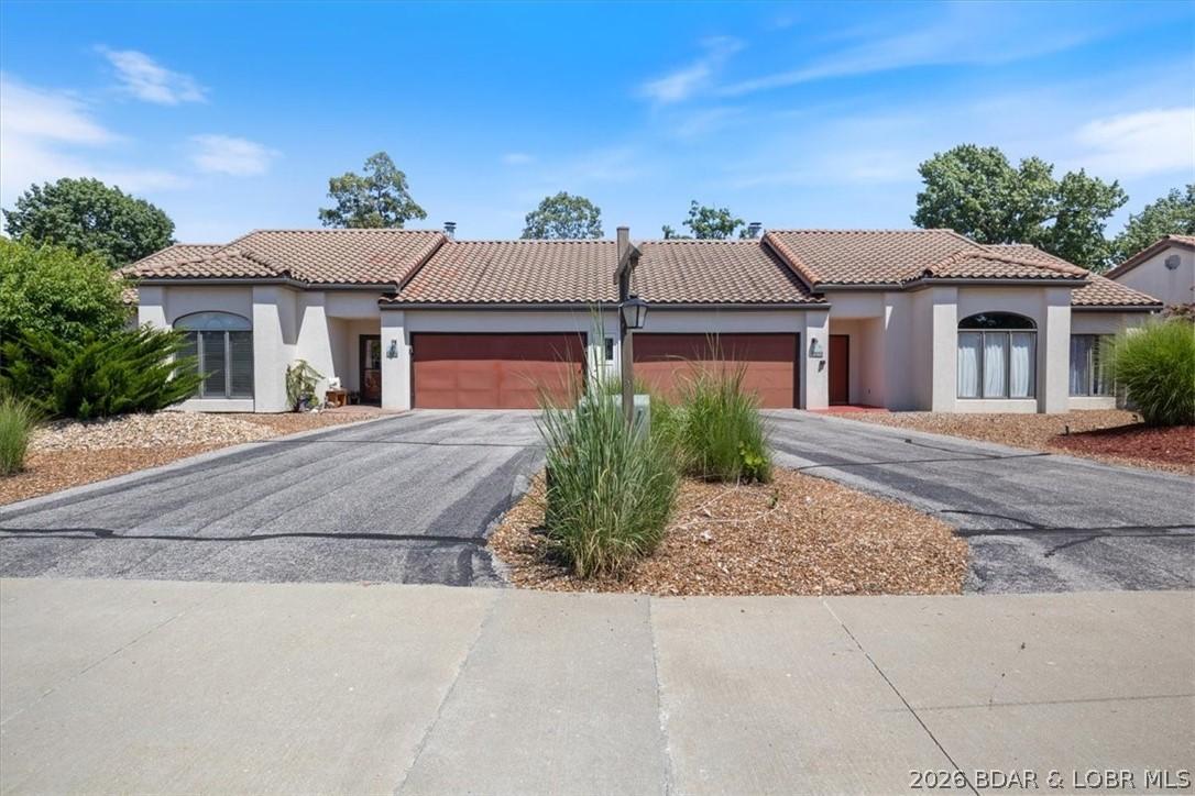 Image 1: Front of Home w/ Lots of Parking