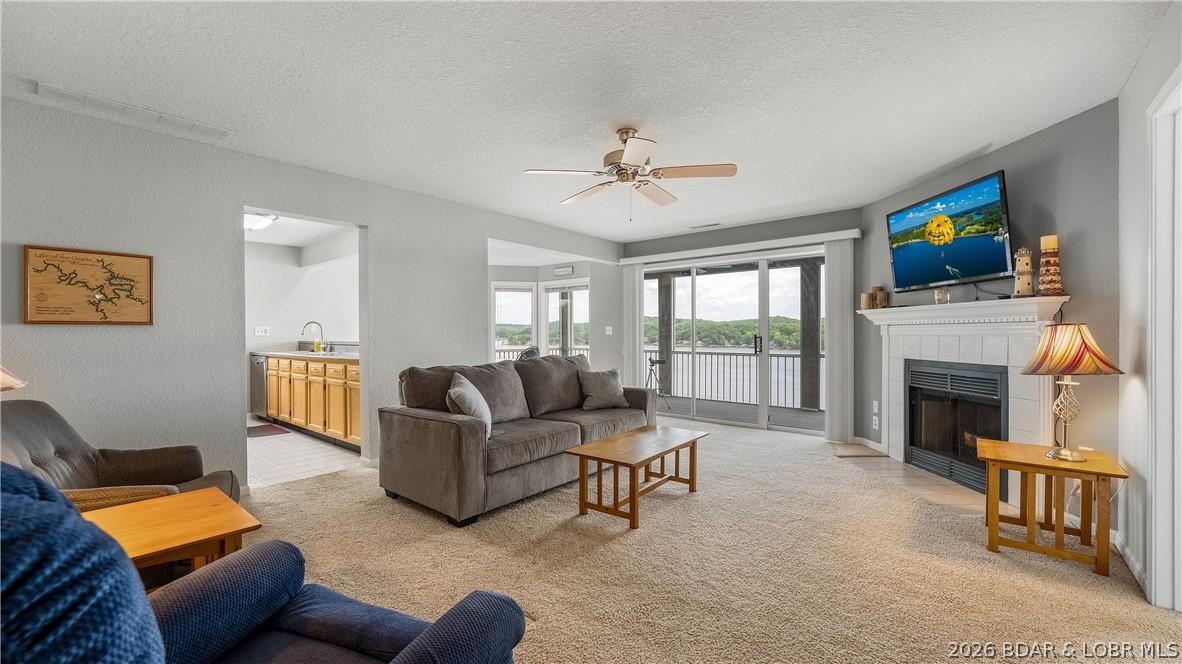 Image 2: Nice open living room to kitchen & dining area.