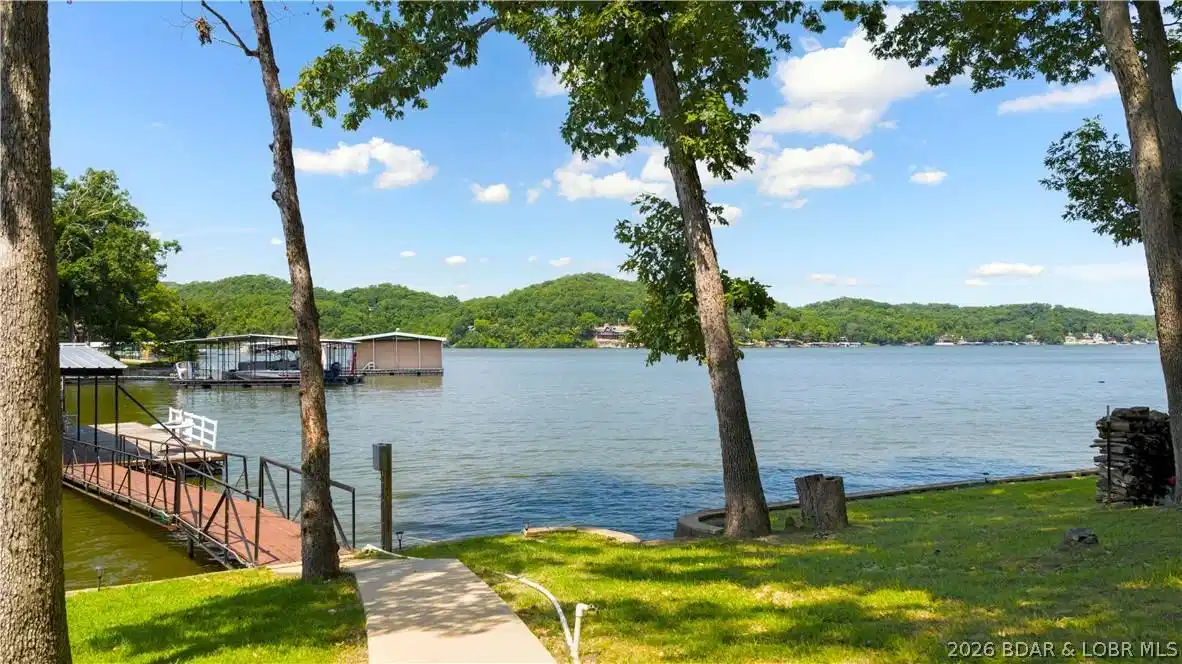 Image 1: BIG view, quiet water, and 160 ft of gentle lake f
