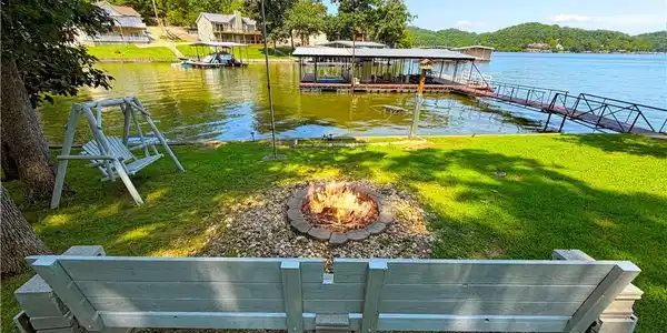 Image 2: Your lot and the lake blend seamlessly as one.  Th