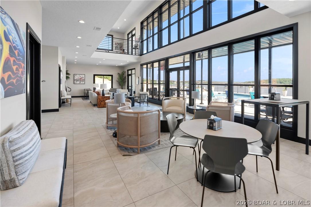Image 4: Pool and lake views thanks to soaring wall of wind