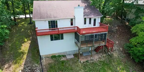 Image 3: Expansive upper deck with private entrance to the