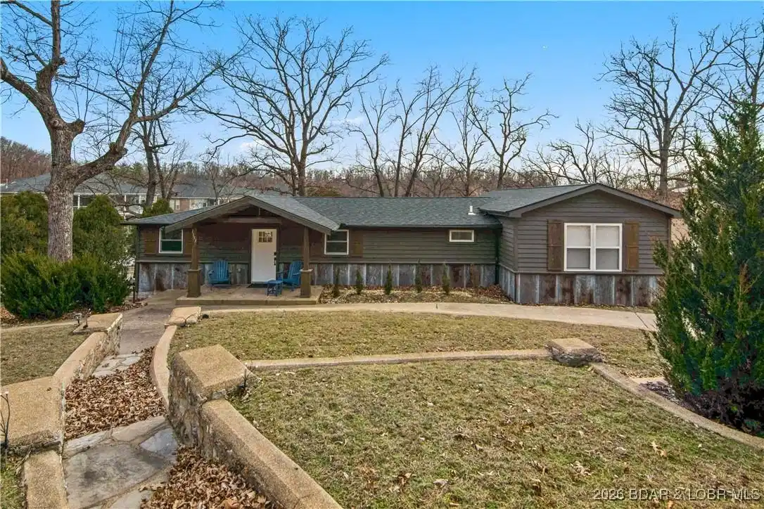 Image 1: Cute with tons of curb appeal and lake access, its