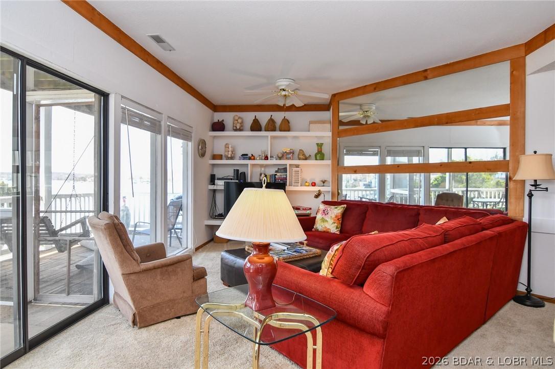 Image 4: Access to the lakeside deck from the living room
