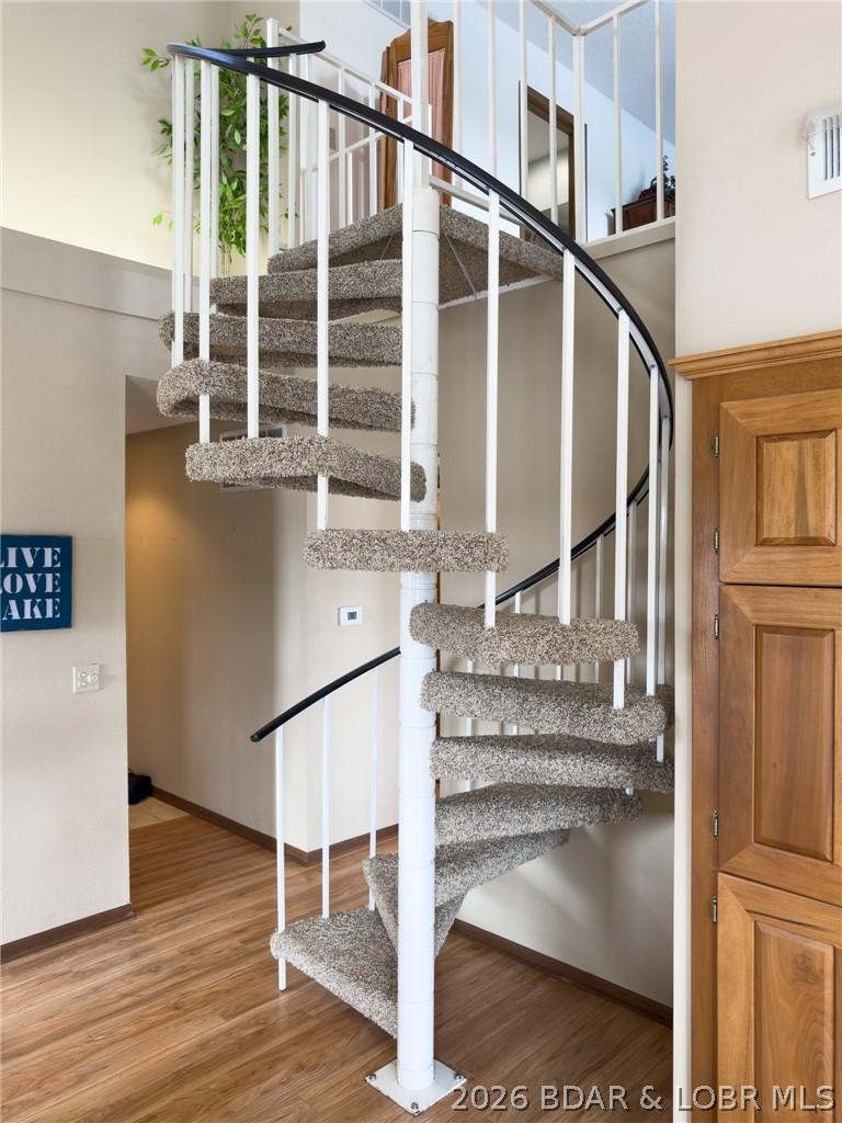 Image 3: Stairs to Upper level loft.