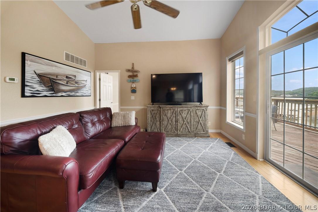 Image 3: Great Room is highlighted by wall of windows and l
