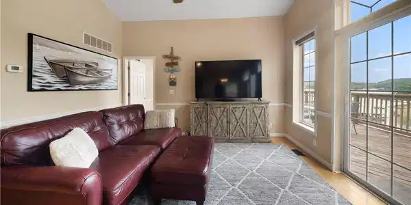 Image 3: Great Room is highlighted by wall of windows and l