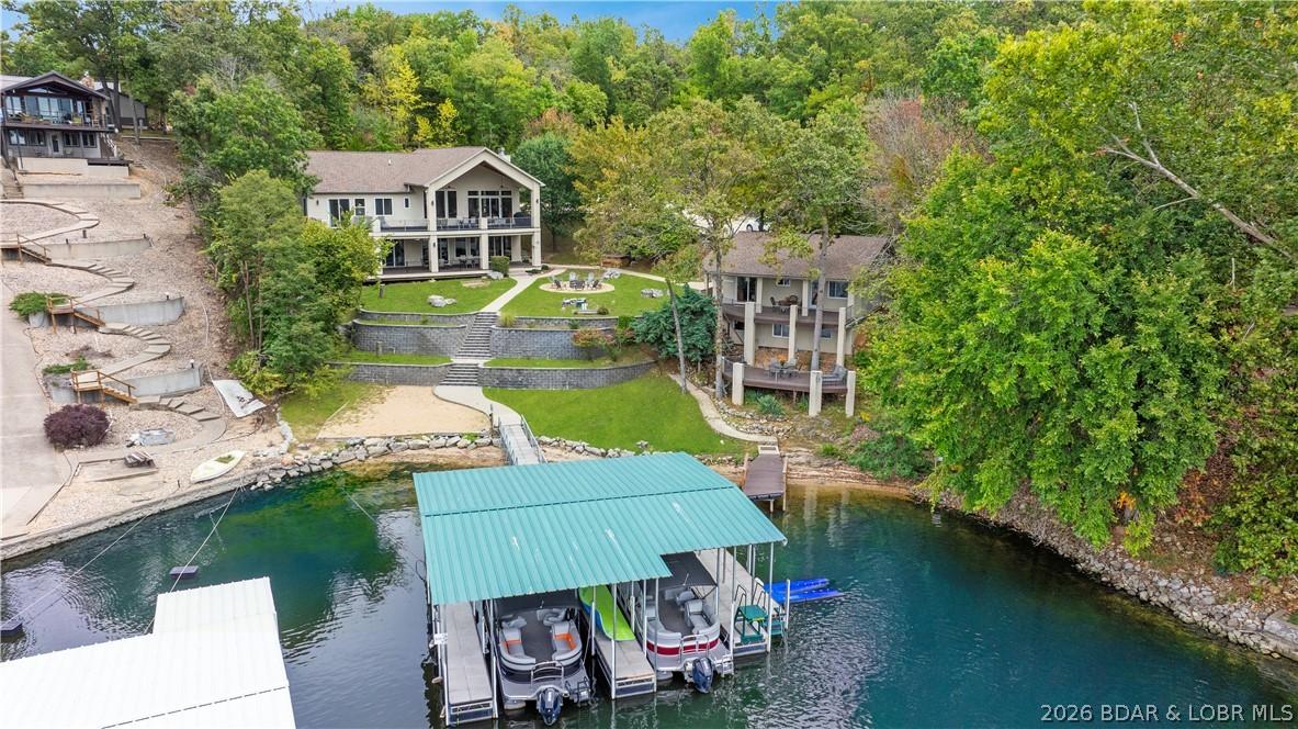 Image 2: Lake view of the entire property!