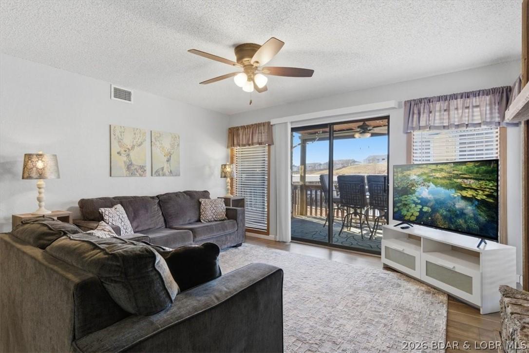 Image 2: Step into the living room&mdash;bright and open.