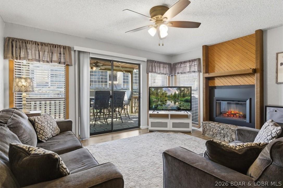 Image 4: Living room showcasing natural light and open layo