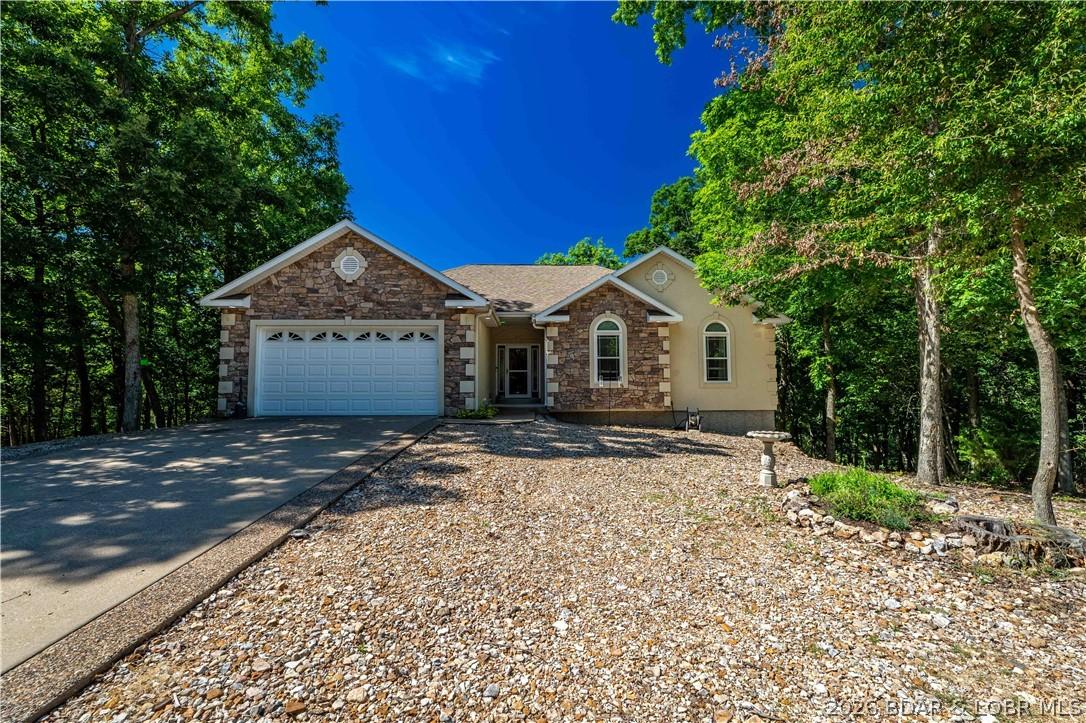 Image 2: Wooded front exterior for ample privacy