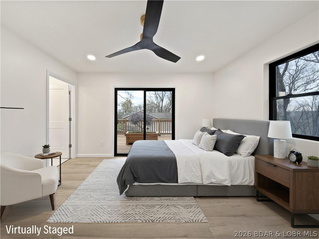 Image 4: Primary Bedroom with ensuite & access to deck